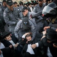 Ultra Orthodox Jewish men being arrested by Israeli police as they block a road during a protest in Jerusalem, Israel, 19 October 2017.  

 Photo by: JINIPIX