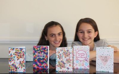 Abi Boyden, left and Rachel Weller, right, with a selection of their cards