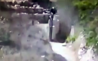 CCTV footage of a Palestinian man lobbing a boulder into the spring, injuring a young Israeli