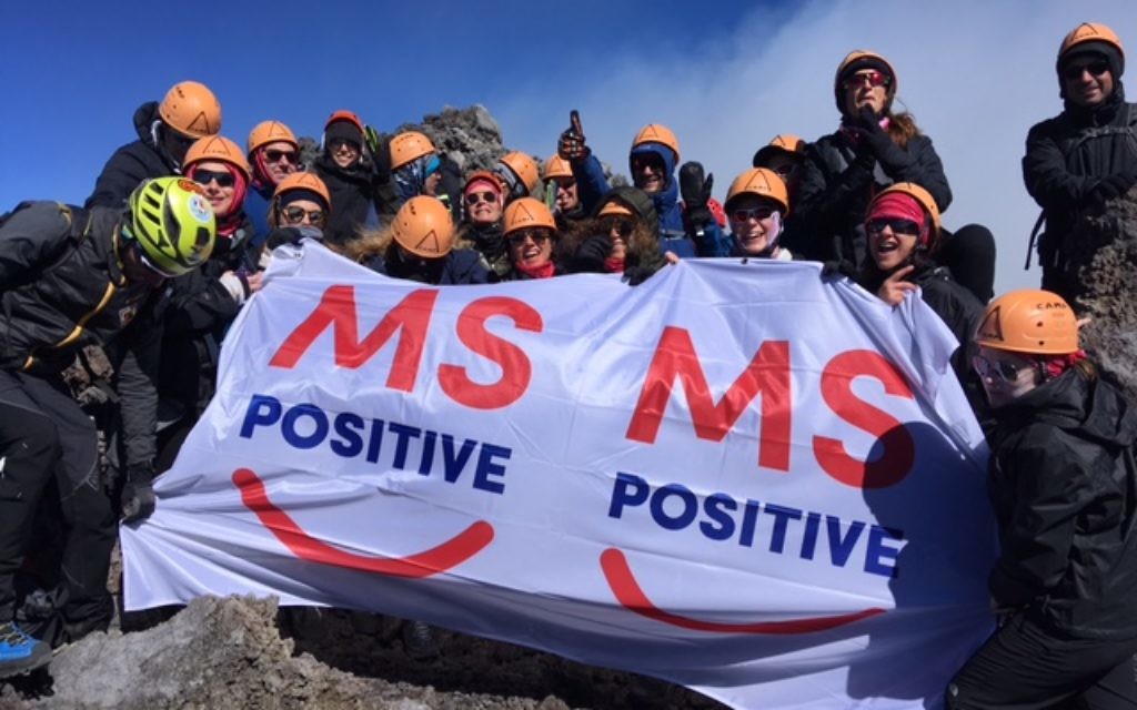 The hiking group at the peak of Mt Edna, where they helped raise £75k