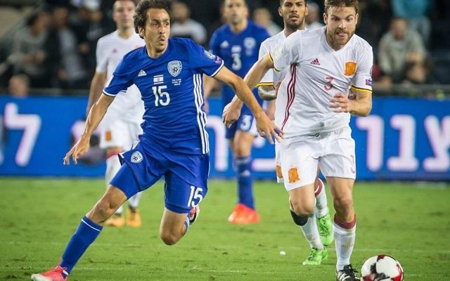 Israel's Yossi Benayoun challenges Spanish goalscorer Asier Illarramendi during their 1-0 defeat in Jerusalem