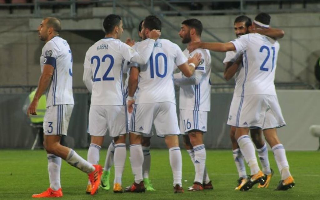 Israel celebrate Eitan Tibi's winning strike