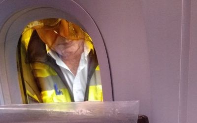 An engineer examines the cracked window on board the El Al Dreamliner flight
Picture Credit: Jewish News