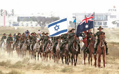 Australian men and women in World War I uniforms recreate the last calvary charge that took place in The Battle of Beersheba 

Credit: EPA/JIM HOLLANDER