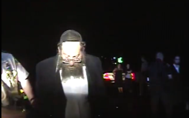 Rabbi Berl Fink being pulled over for speeding in Vermont. (Screenshot from Vermont State Police video)