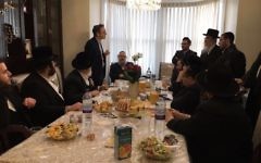 Jonathan Goldstein at the home of a Stamford Hill community member