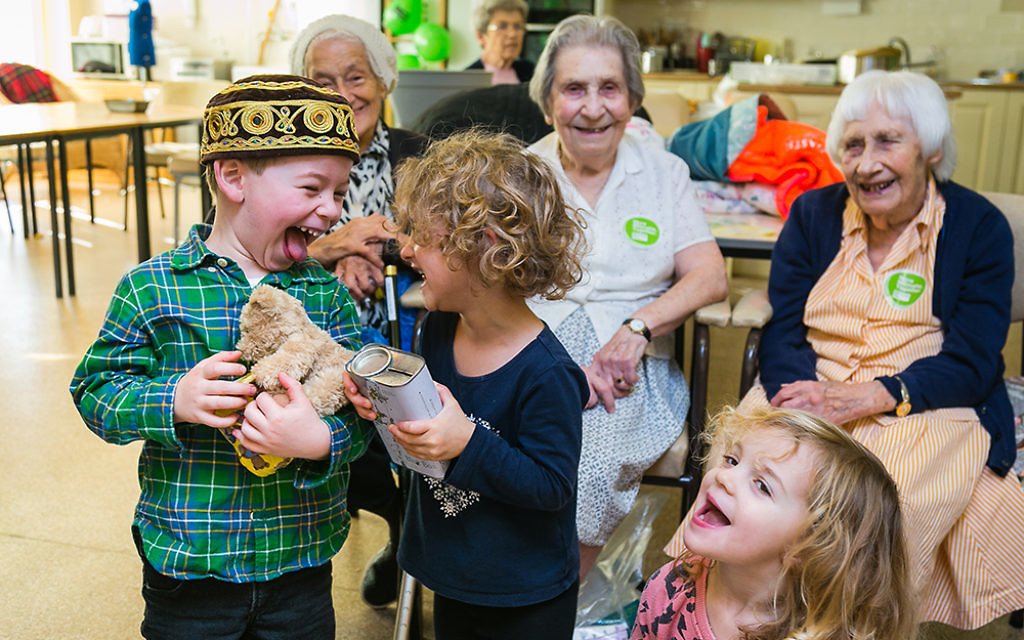 Fun as Apples and Honey Nursery visit Nightingale House care home in Clapham - picture by Yakir Zur