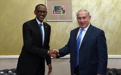 Rwandan President Paul Kagame (left) greets Israeli PM Benjamin Netanyahu