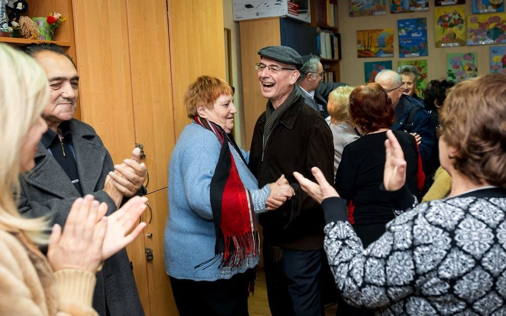 Mike Posen and other members of Golders Green Synagogue join in a social activity at the Jewish Community Centre, Zaporizhia