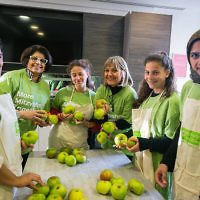 Mitzvah Day founder Laura Marks and a joint Jewish and Muslim group cook for the homeless at JW3 - Picture by Yakir Zur