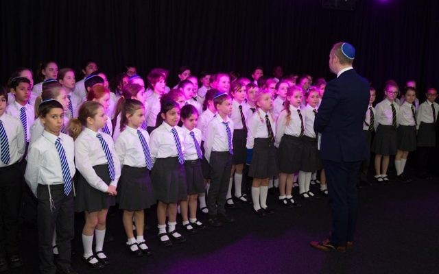 Students at the new school singing