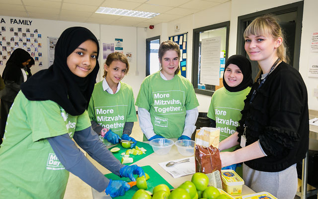 Muslim and Jewish pupils from JCOSS and Lady Nafisa schools cooking for the homeless for charity Sufra - picture by Yakir Zur