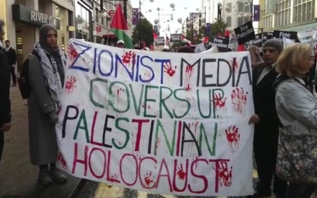 Protestors with their anti-Israel banners at the central London march. Picture: CAA
