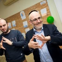 Rabbi Belovski and World Jewish Relief staff member Sam Schryer take part in activities at the Jewish Community Centre in Zaporizhia, Ukraine.