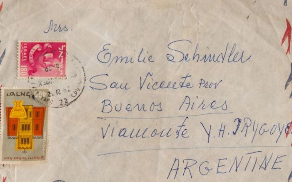 Emile Schindler's German passport and letter with Israeli stamps are among the archive.