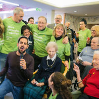 Tracy-Ann Oberman, Dan Patterson, The Mayor of Camden and MD Founder Laura Marks among the volunteers singing for the elderly at Spring Grove care home - picture by Yakir Zur