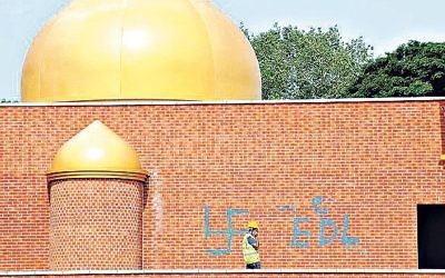 Worrying times: A Worcestershire mosque daubed with a swastika