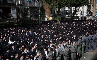 Thousands of followers of Rabbi Aharon Leib Shteinman attend his funeral in the Ultra Orthodox city of Bnei Brak, on December 12, 2017. Rabbi Aharon Leib Shteinman passed away earlier this morning at the age of 104. Photo by: JINIPIX