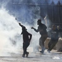 Palestinians clash with Israeli troops in December 2017 

(AP Photo/Nasser Shiyoukhi)