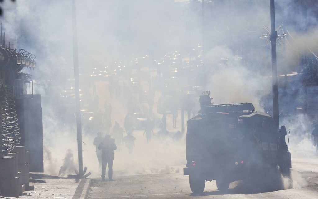 Palestinians clash with Israeli troops during a protest against U.S. President Donald Trump's decision to recognize Jerusalem as the capital of Israel in the West Bank city of Bethlehem, Friday, Dec.8, 2017.(AP Photo/Nasser Shiyoukhi)