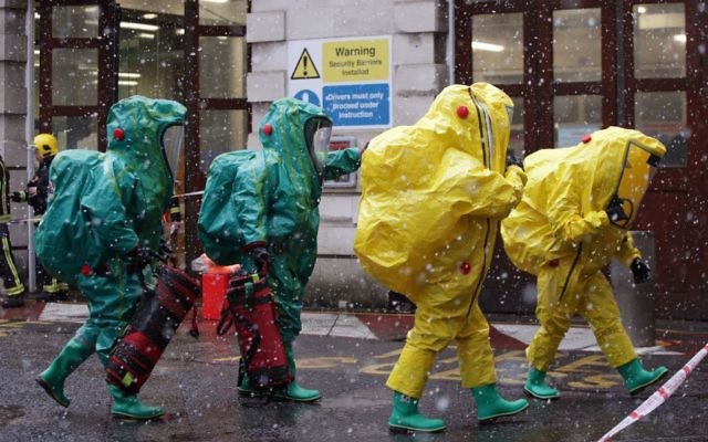 Members of the police, fire brigade and ambulance service during a joint exercise to test their response to a ÔHAZMATÕ type ncident involving a hazardous substance, at the Israeli Embassy in Kensington, London. 

Photo credit: Yui Mok/PA Wire