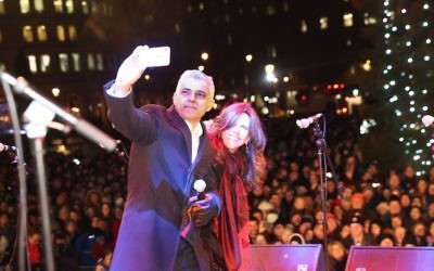 London Mayor Sadiq Khan takes a selfie at Chanukah in the Square 

Credit: Marc Morris Photography