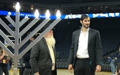 Omir Casspi lit the menorah on court, having helped the Golden State Warriors to victory over the Dallas Mavericks Omir Casspi lit the menorah on court, having helped the Golden State Warriors to victory over the Dallas Mavericks