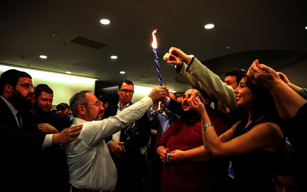 Young and old celebrate havdallah at the end of Shabbat during Limmud FSU in the city of St Petersburg

Photo by Masha Lvova
