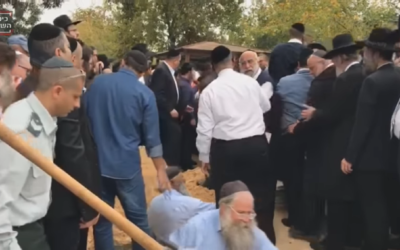 Thousands of mourners gathered in Israel on Wednesday for the funerals of a mother and three children killed in a house fire (Screenshot from Youtube)