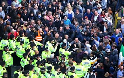 Police stopping anti-fascist protesters from clashing with far-right National Action members 

Photo credit: Peter Byrne/PA Wire