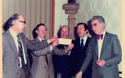 Bet Tikvah founding fathers ( from right) Joe Swinburne, Larry Peters, Barry Lautman and Harold Miller receiving a cheque from Liberal Judaism Chair Clive Winston to buy the building