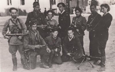 Abba Kovner stands at the centre of the Vilna Ghetto Fighters, some of whom later joined Nakam (The Avengers)