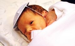 Baby during a brit milah ceremony