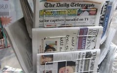 Newspaper stand with international papers Newspaper stand with international papers