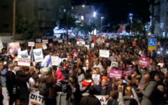 20,000 demonstrators protest in Tel Aviv against the deportation of thousands of asylum seekers 

Credit: Screenshot from YouTube