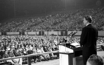 Evangelist Billy Graham  speaking at Doak Campbell Stadium in Tallahassee, Florida