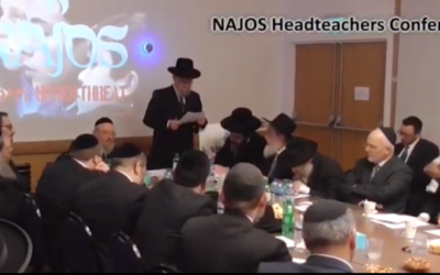 Screengrab from the video attacking allies of the community. Still shows the NAJOS headteachers conference