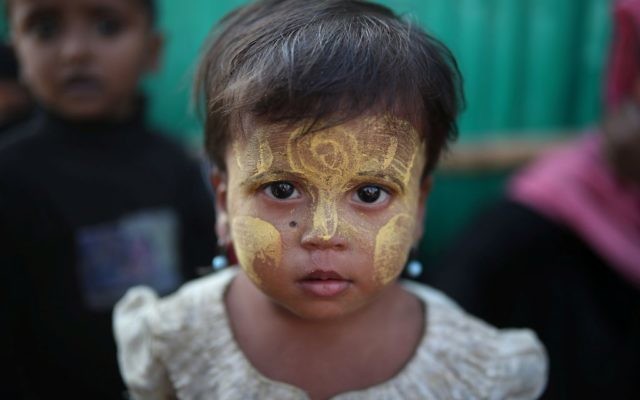 A Rohingya refugee child looks on at Jamtoli camp in Cox's Bazar, Bangladesh
