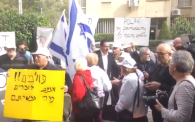 Survivors and activists protest outside the Polish Embassy in Tel Aviv. 

Screenshot from a video on Jerusalem Post