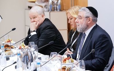 Rabbi Goldschmidt (right) speaks during a conference in February