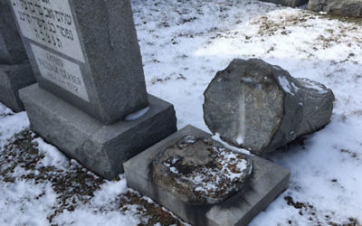 Headstones were toppled at the Waad Hakolel Cemetery, also known as the Stone Road Cemetery, in Rochester, N.Y. (Courtesy of News 10 NBC WHEC) (Via JTA)