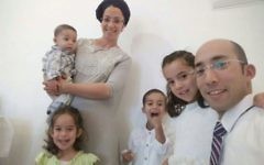 Itamar Ben Gal (right) with his wife and four young children.
Source: @NewsFlashIL on Twitter Itamar Ben Gal (right) with his wife and four young children.
Source: @NewsFlashIL on Twitter