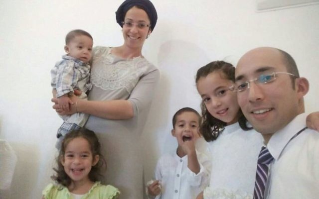 Itamar Ben Gal (right) with his wife and four young children. 

Source: @NewsFlashIL on Twitter