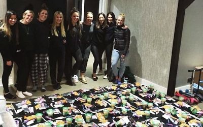 Group of Jewish friends with care packs for the homeless this winter