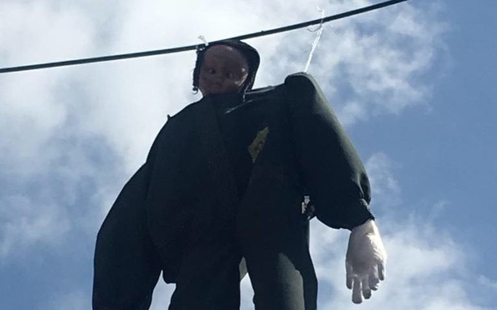Effigy of an IDF soldier hung up on a wire in an Orthodox neighbourhood of Jerusalem