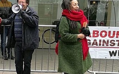 Jackie Walker (right) with Tony Greenstein (left) in front of a Momentum banner outside the Labour Party's HQ