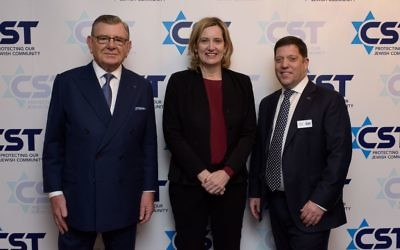 L-R at CST's annual dinner in 2018: Gerald Ronson, and former Home Secretary Amber Rudd, with CST Chief Executive David Delew