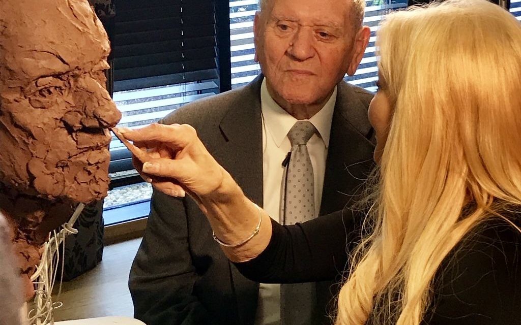 Frances Segelman sculpting Holocaust survivor Arek Hersh