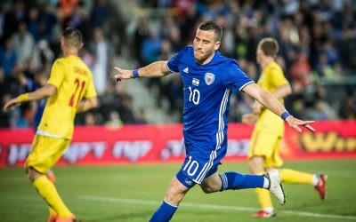 Tomer Hemed celebrates a goal against Romania