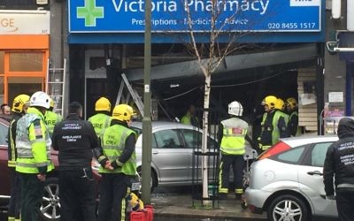 A silver car mounted the pavement before ploughing into the front of the Victoria Pharmacy